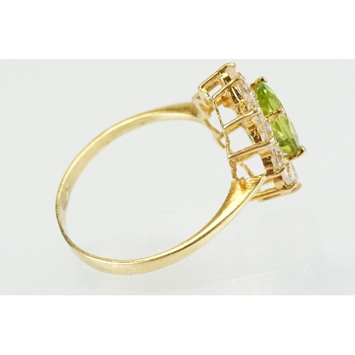 274 - 18ct gold peridot and white stone jewellery suite to include ring, earrings and pendant necklace, ea... 