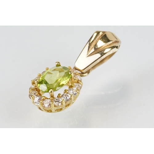 274 - 18ct gold peridot and white stone jewellery suite to include ring, earrings and pendant necklace, ea... 