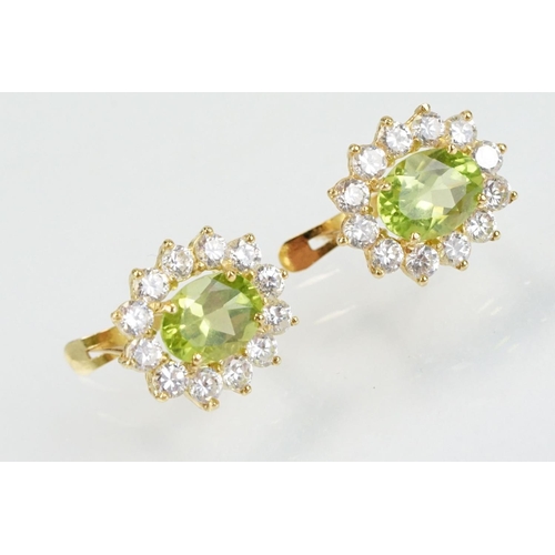 274 - 18ct gold peridot and white stone jewellery suite to include ring, earrings and pendant necklace, ea... 