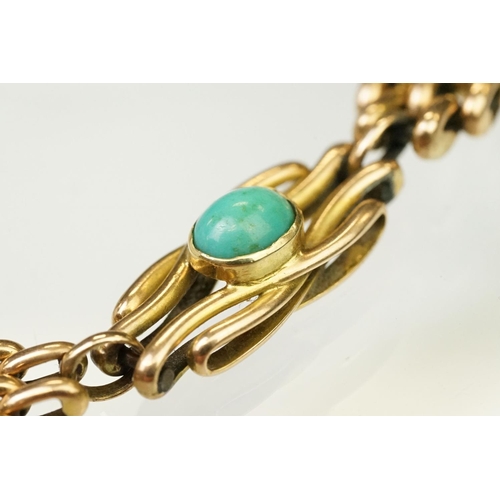 29 - 15ct gold and turquoise gate link bracelet. The bracelet being beze set with five oval turquoise cab... 