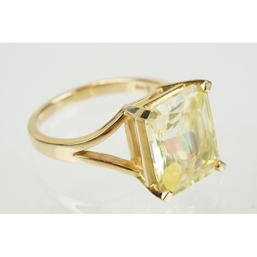 294 - 14ct gold and yellow stone dress ring set with a large yellow gem stone. Marked 14k to the band. Siz... 