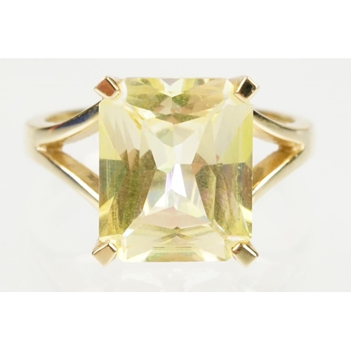 294 - 14ct gold and yellow stone dress ring set with a large yellow gem stone. Marked 14k to the band. Siz... 