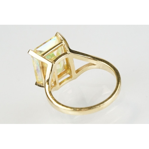 294 - 14ct gold and yellow stone dress ring set with a large yellow gem stone. Marked 14k to the band. Siz... 