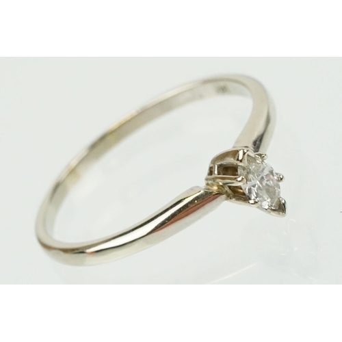 297 - 14ct white gold and diamond solitaire ring being set with a marquise cut diamond. Marked 14k to shan... 