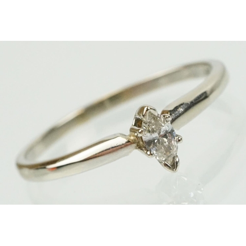 297 - 14ct white gold and diamond solitaire ring being set with a marquise cut diamond. Marked 14k to shan... 