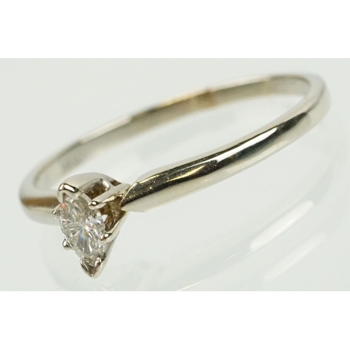 297 - 14ct white gold and diamond solitaire ring being set with a marquise cut diamond. Marked 14k to shan... 