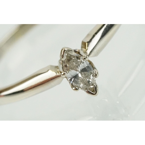 297 - 14ct white gold and diamond solitaire ring being set with a marquise cut diamond. Marked 14k to shan... 