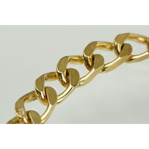 300 - 9ct gold hallmarked flat curb link bracelet. Hallmarked London 1984. Measures 8 inches.