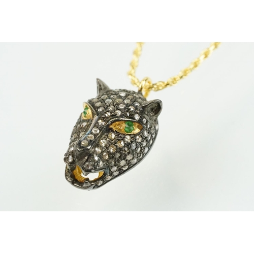 316 - Panther head pendant being set throughout with rose cut diamonds with tsavorite garnets set to each ... 