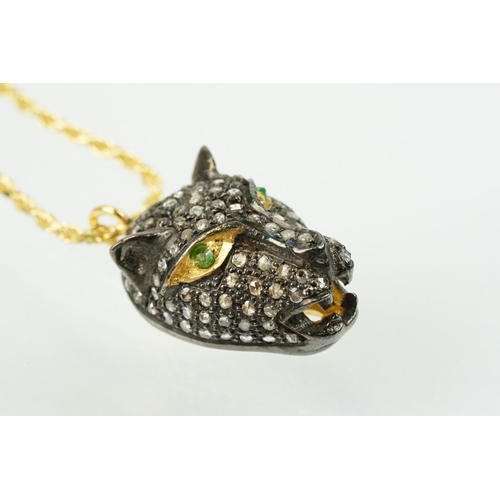 316 - Panther head pendant being set throughout with rose cut diamonds with tsavorite garnets set to each ... 