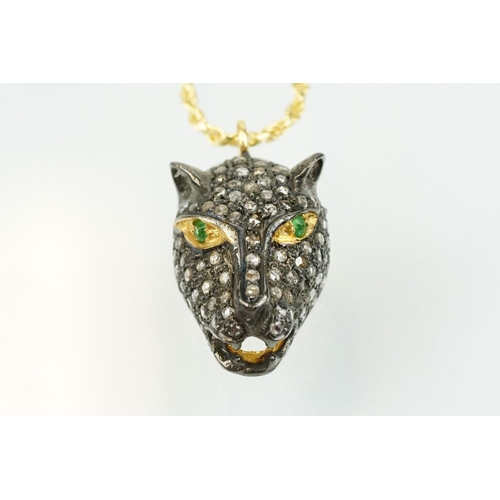 316 - Panther head pendant being set throughout with rose cut diamonds with tsavorite garnets set to each ... 