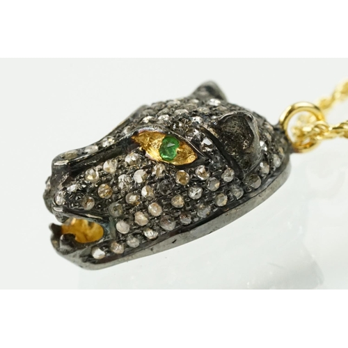 316 - Panther head pendant being set throughout with rose cut diamonds with tsavorite garnets set to each ... 