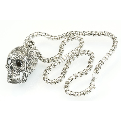 322 - Large stainless steel momento mori style skull pendant being set with black cubic zirconia eyes, mou... 