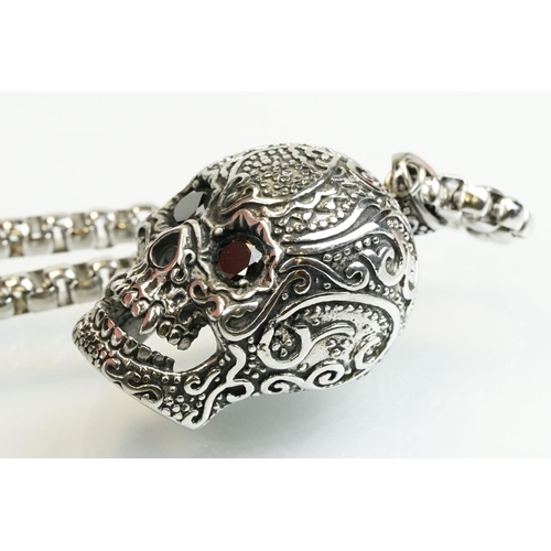 322 - Large stainless steel momento mori style skull pendant being set with black cubic zirconia eyes, mou... 