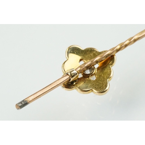 324 - Two 19th Century stick pins to include a diamond, coral and half pearl finial pin (unmarked) and an ... 