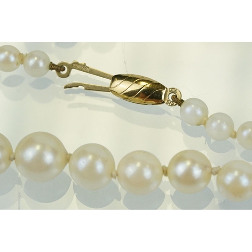 326 - Cultured pearl beaded necklace with a 9ct gold clasp together with a pair of matching pearl drop ear... 