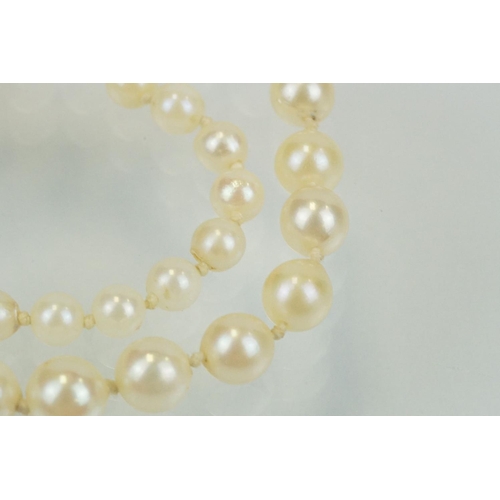 326 - Cultured pearl beaded necklace with a 9ct gold clasp together with a pair of matching pearl drop ear... 