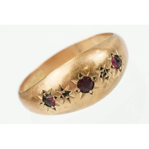 341 - 18ct gold and purple stone ring being having a round cut purple stone in a four prong setting (marke... 