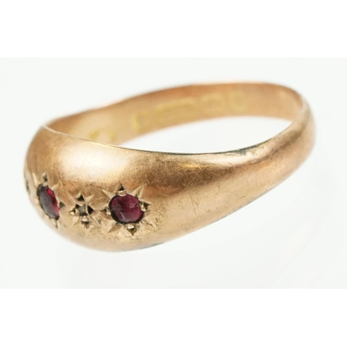 341 - 18ct gold and purple stone ring being having a round cut purple stone in a four prong setting (marke... 