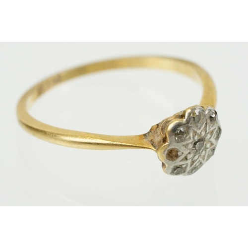 343 - Three antique rings to include an 18ct gold daisy ring (marked 18ct, size M.5), 9ct gold signet ring... 