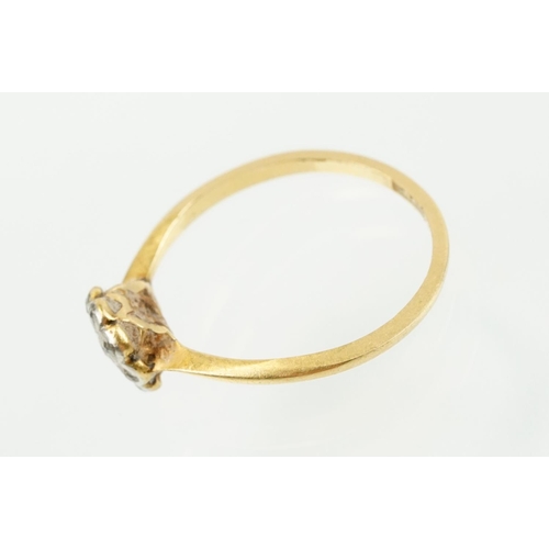 343 - Three antique rings to include an 18ct gold daisy ring (marked 18ct, size M.5), 9ct gold signet ring... 