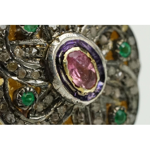 346 - Silver gilt dress ring having a flower shaped panel set with a pink tourmaline to centre, surrounded... 