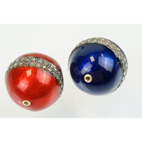 350 - Two enamelled beads each having a central band pave set with diamond accent stones. To include one r... 