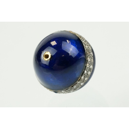 350 - Two enamelled beads each having a central band pave set with diamond accent stones. To include one r... 