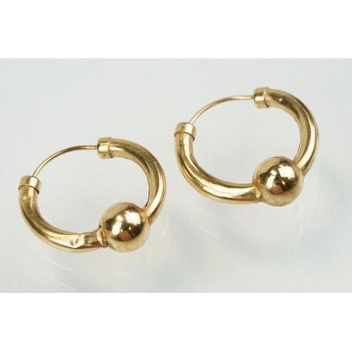 351 - 9ct gold hoop earrings to include a pair of Claddagh earrings, pair of ball hoops and two faceted ho... 