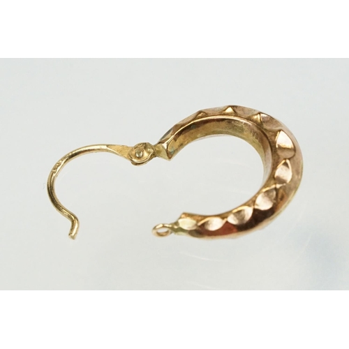 351 - 9ct gold hoop earrings to include a pair of Claddagh earrings, pair of ball hoops and two faceted ho... 