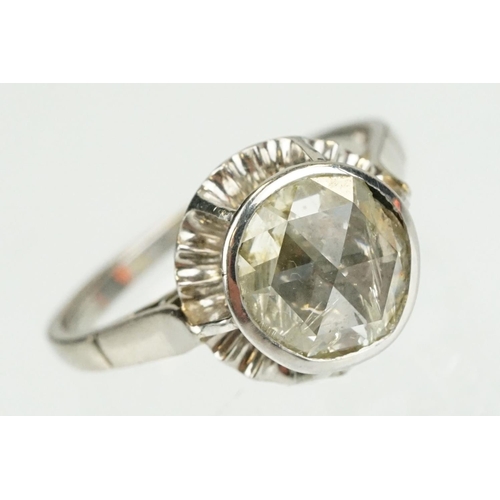 369 - Diamond solitaire white metal ring, rose cut diamond, assessed clarity I2, assessed colour tinted, d... 