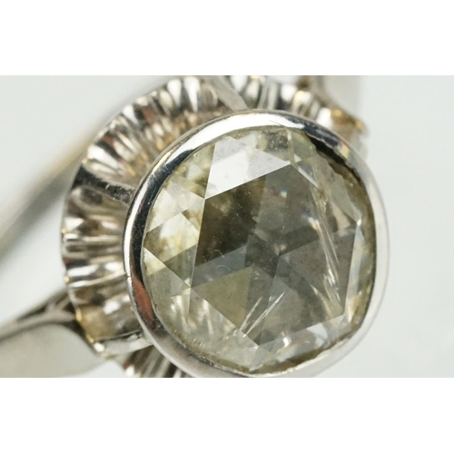 369 - Diamond solitaire white metal ring, rose cut diamond, assessed clarity I2, assessed colour tinted, d... 