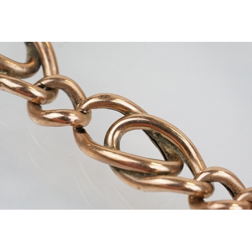 37 - Victorian 9ct rose gold bracelet having curb and fancy links with tongue in groove clasp. Marked 9ct... 