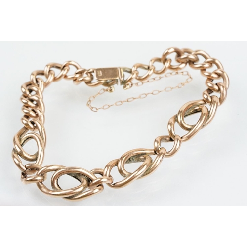 37 - Victorian 9ct rose gold bracelet having curb and fancy links with tongue in groove clasp. Marked 9ct... 