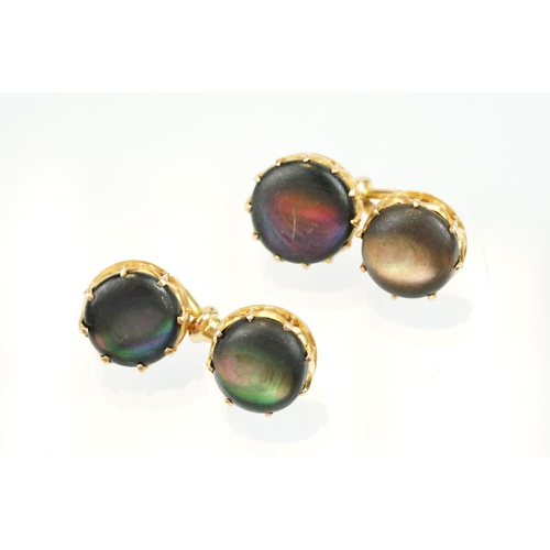 390 - Pair of 19th Century Victorian 15ct gold and abalone shell cufflinks. Each head set with a round she... 