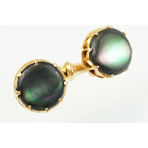 390 - Pair of 19th Century Victorian 15ct gold and abalone shell cufflinks. Each head set with a round she... 