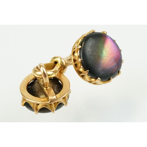 390 - Pair of 19th Century Victorian 15ct gold and abalone shell cufflinks. Each head set with a round she... 