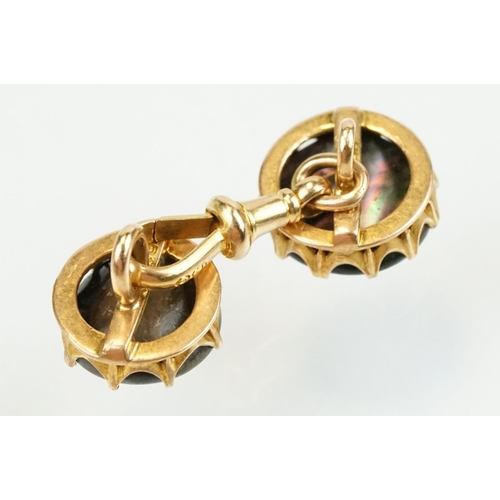 390 - Pair of 19th Century Victorian 15ct gold and abalone shell cufflinks. Each head set with a round she... 