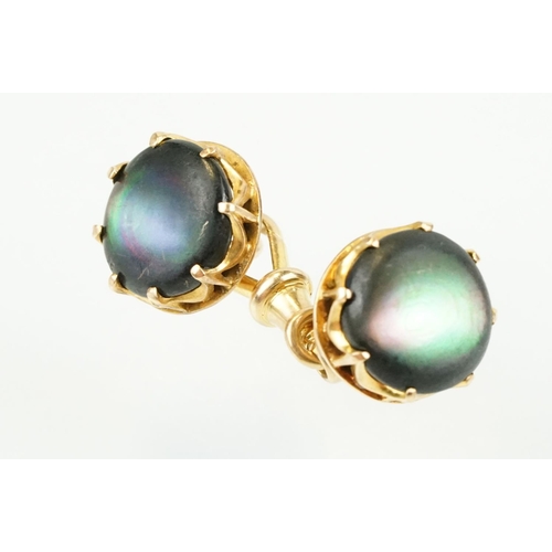 390 - Pair of 19th Century Victorian 15ct gold and abalone shell cufflinks. Each head set with a round she... 