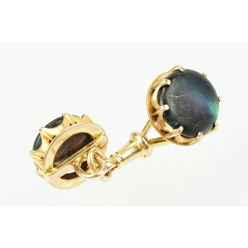 390 - Pair of 19th Century Victorian 15ct gold and abalone shell cufflinks. Each head set with a round she... 