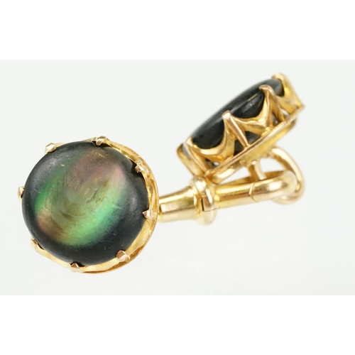 390 - Pair of 19th Century Victorian 15ct gold and abalone shell cufflinks. Each head set with a round she... 