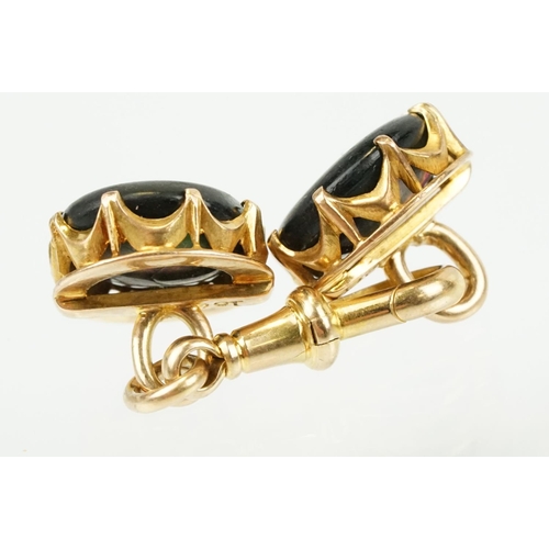 390 - Pair of 19th Century Victorian 15ct gold and abalone shell cufflinks. Each head set with a round she... 