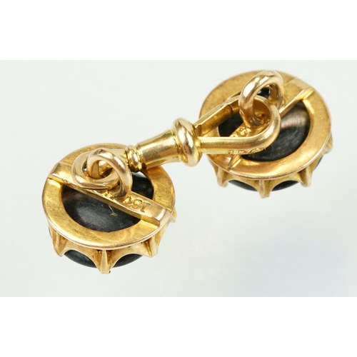 390 - Pair of 19th Century Victorian 15ct gold and abalone shell cufflinks. Each head set with a round she... 