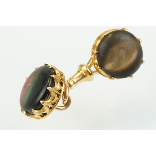 390 - Pair of 19th Century Victorian 15ct gold and abalone shell cufflinks. Each head set with a round she... 