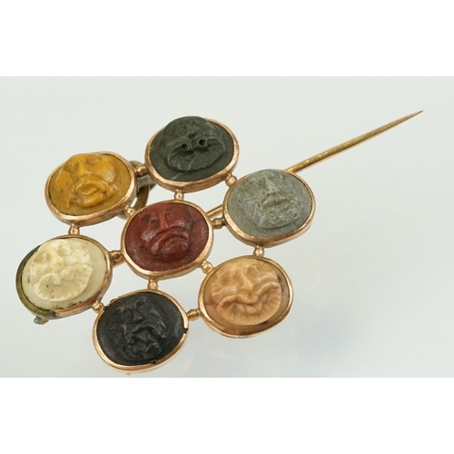 391 - Collection of Victorian and later brooches to include a Victorian carved stone cameo brooch featurin... 