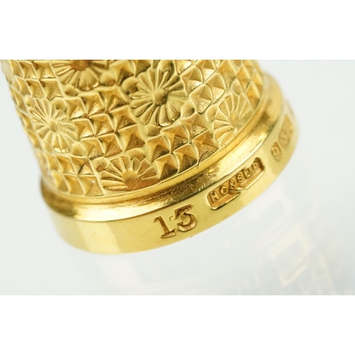 396 - 9ct gold hallmarked thimble with moulded details, size 15. Hallmarked Birmingham 1902, HG & S Ltd.