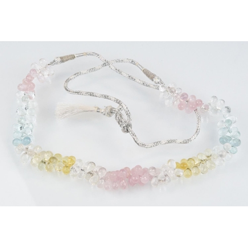 44 - Gemstone necklace strung with pink, white, blue and yellow faceted gemstone drops including aquamari... 