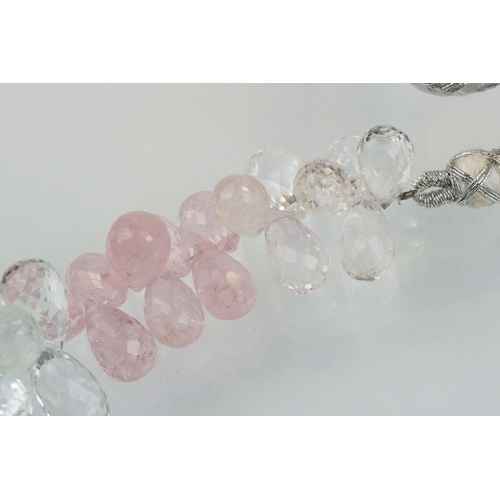 44 - Gemstone necklace strung with pink, white, blue and yellow faceted gemstone drops including aquamari... 