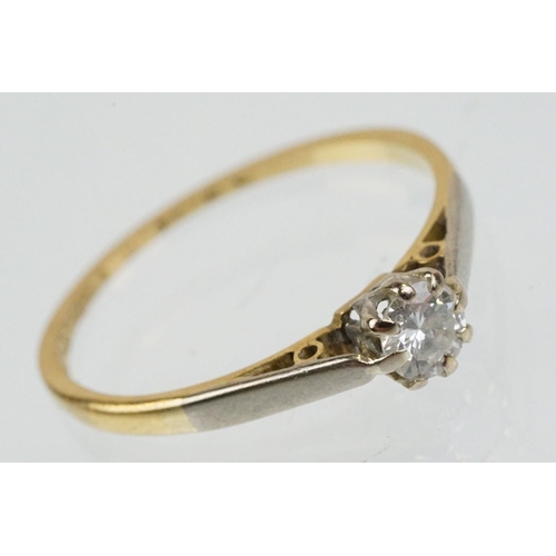 46 - 18ct gold and platinum diamond solitaire ring. The ring being set with a round brilliant cut diamond... 