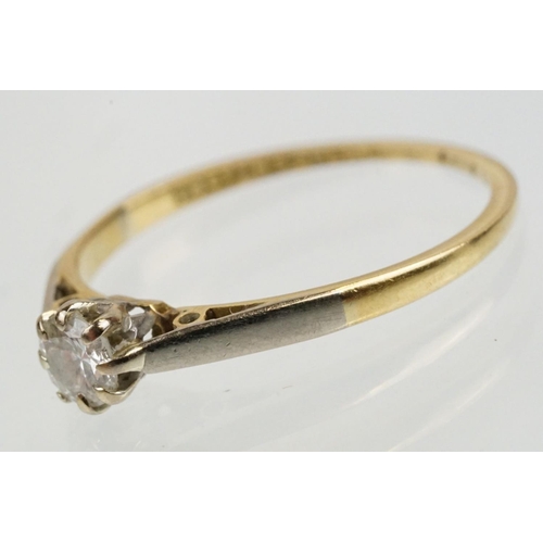 46 - 18ct gold and platinum diamond solitaire ring. The ring being set with a round brilliant cut diamond... 